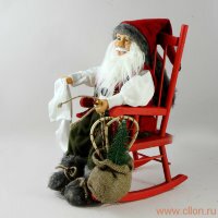Кукла Деда Мороза на стуле